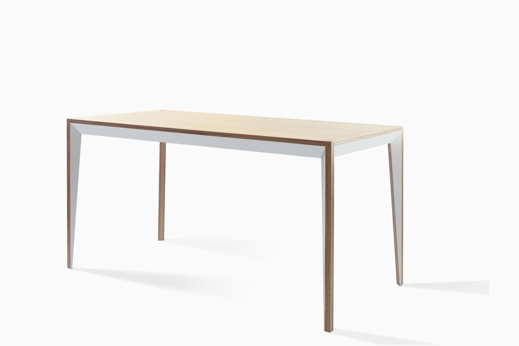 Merging clean lines with warm materials, the faceted geometry of the MiMi desk creates a slender, elegant profile punctuated with painted surfaces that capture light. This modern and graceful design returns contemporary Italian craft to the office