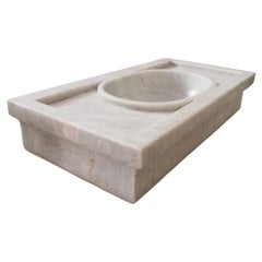 Lavabo clásico de mármol y piedra