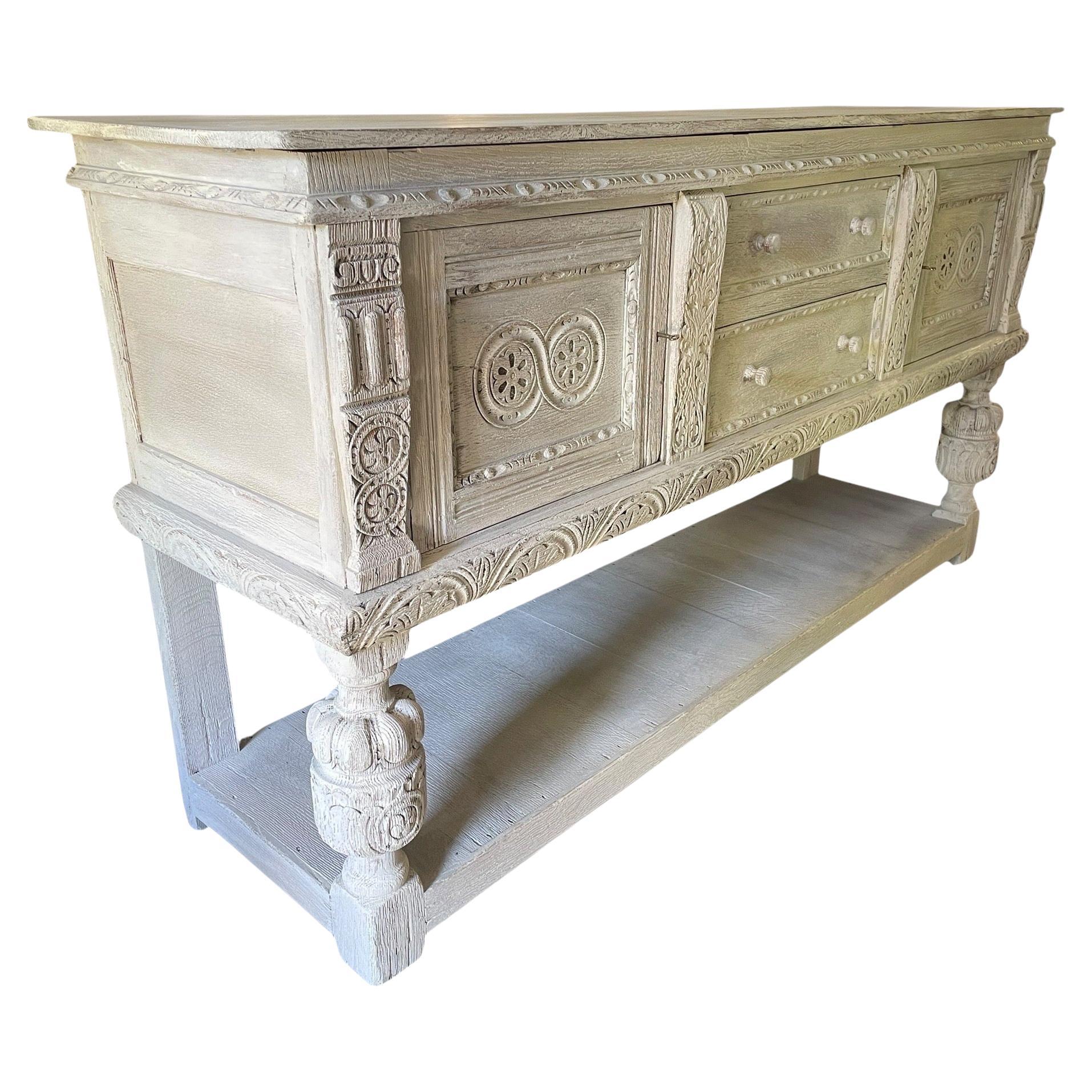 English Limed Oak sideboard 
Excellent cabinet work combined with the best oak carving 
1970s revival piece 
66” long 
