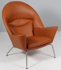 Fauteuil « Oculus » de Hans J. Wegner, en cuir de noyer pleine fleur