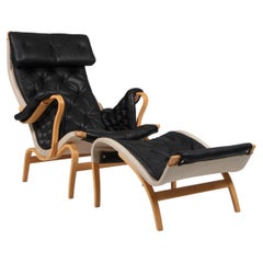 Bruno Mathsson Pernilla Lounge Chair with Ottoman, in patinated leather
