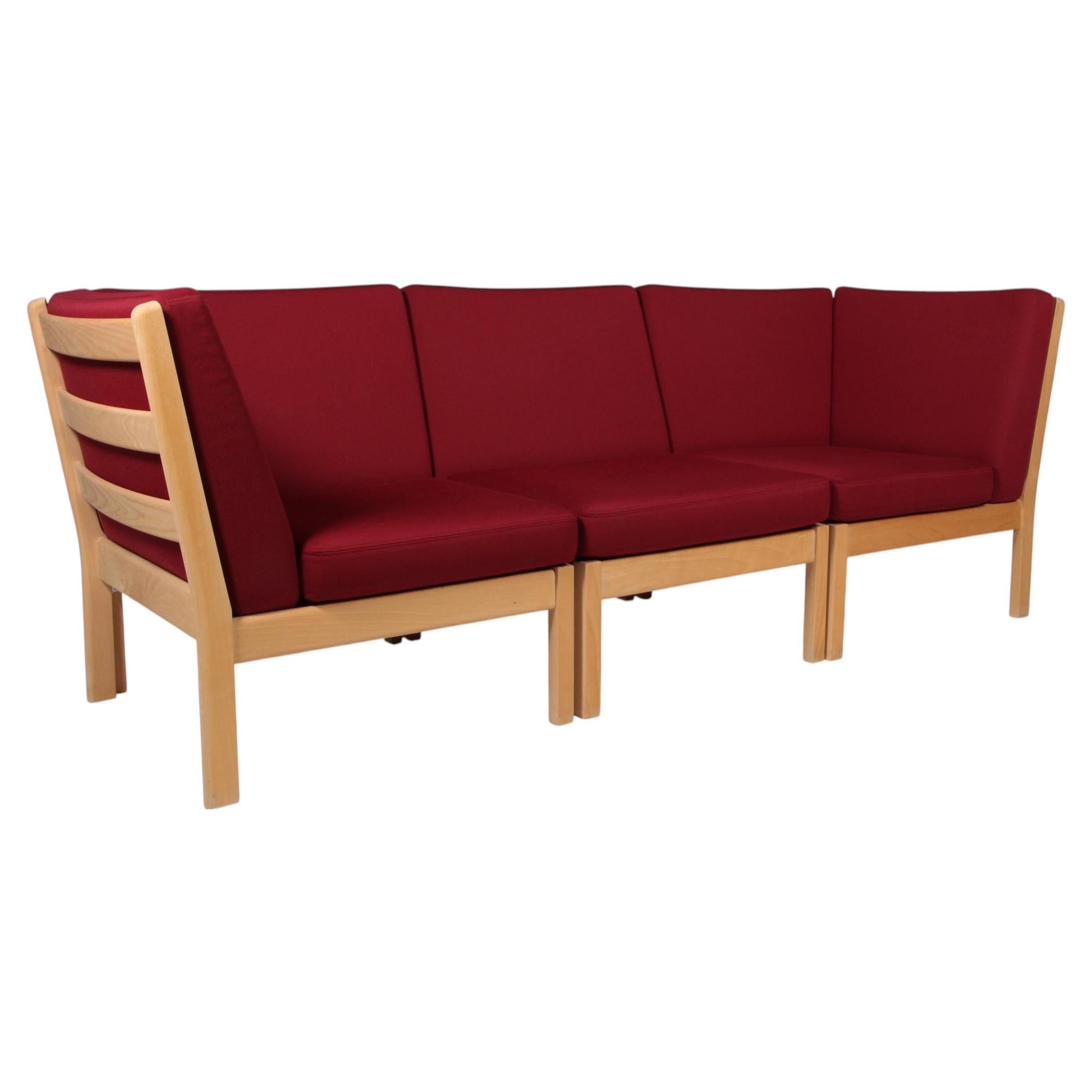 Hans J. Wegner Modul sofa, beech and red wool For Sale