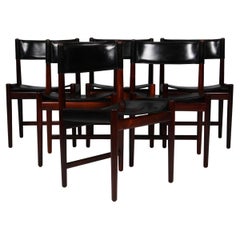 Kurt Østervig, sillas de comedor de madera de palisandro y piel de tope negra