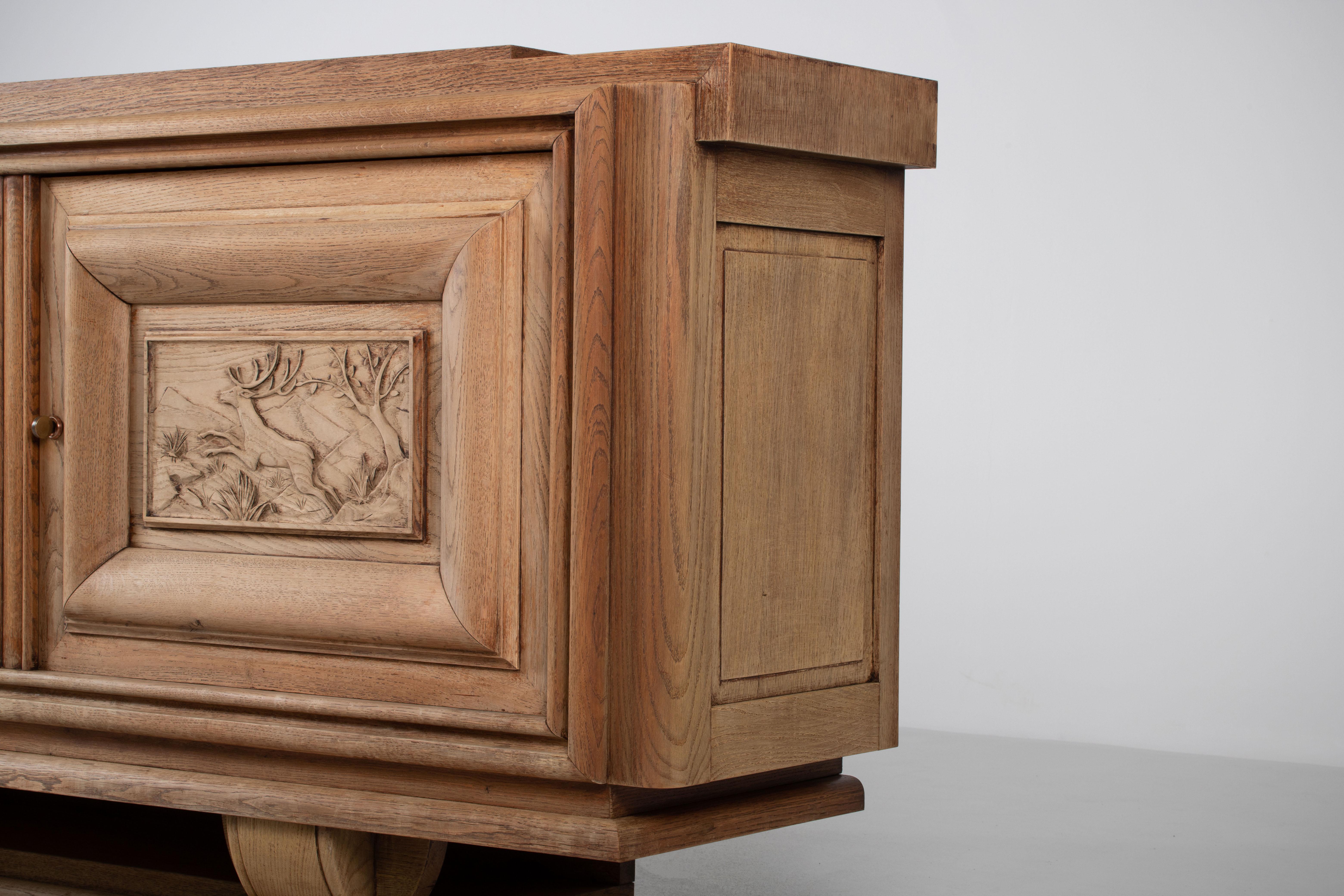 Mid-Century Modern French 1940s Bleached Oak Sideboard with Carved Hunting Scene Panels For Sale
