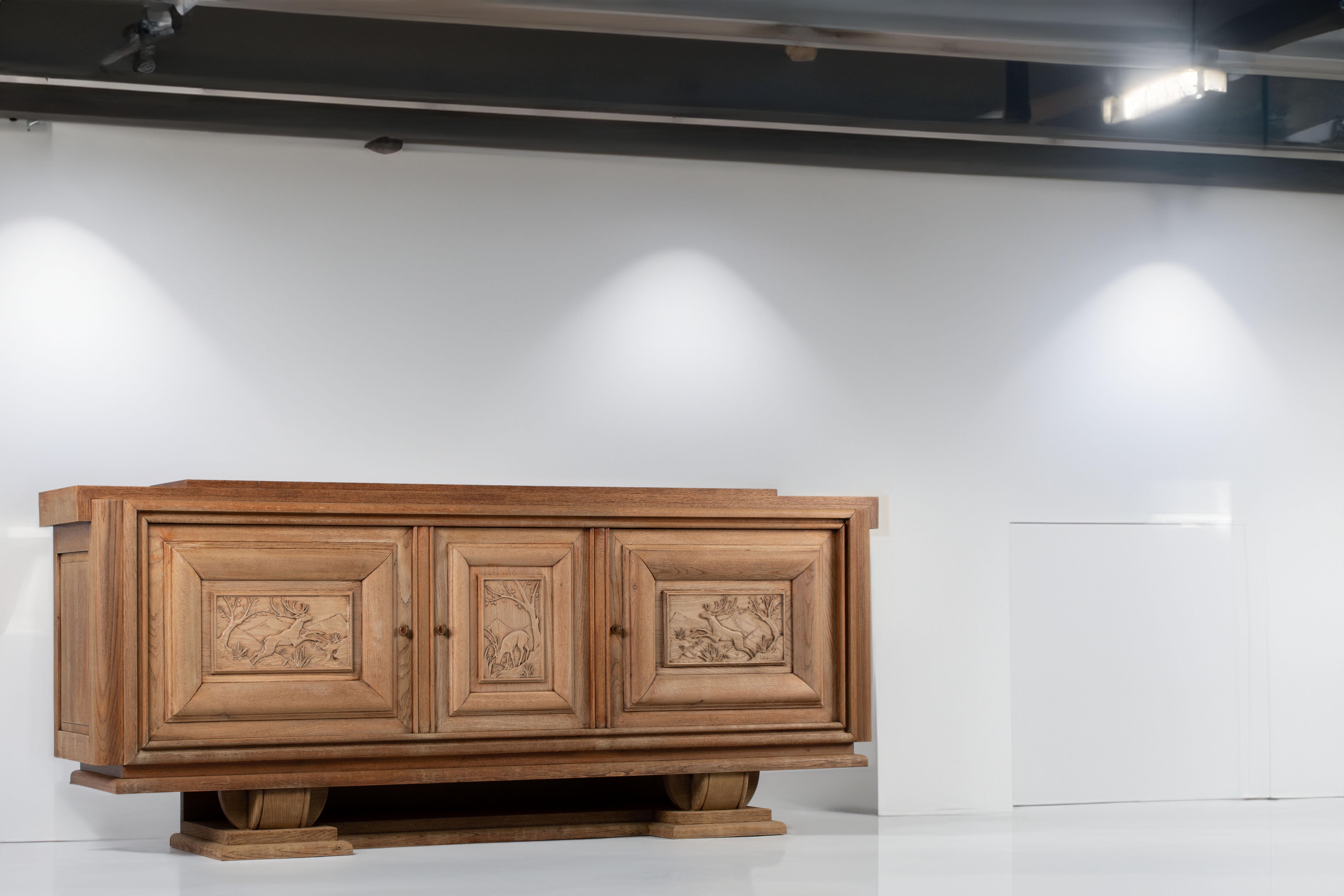 Mid-20th Century French 1940s Bleached Oak Sideboard with Carved Hunting Scene Panels For Sale