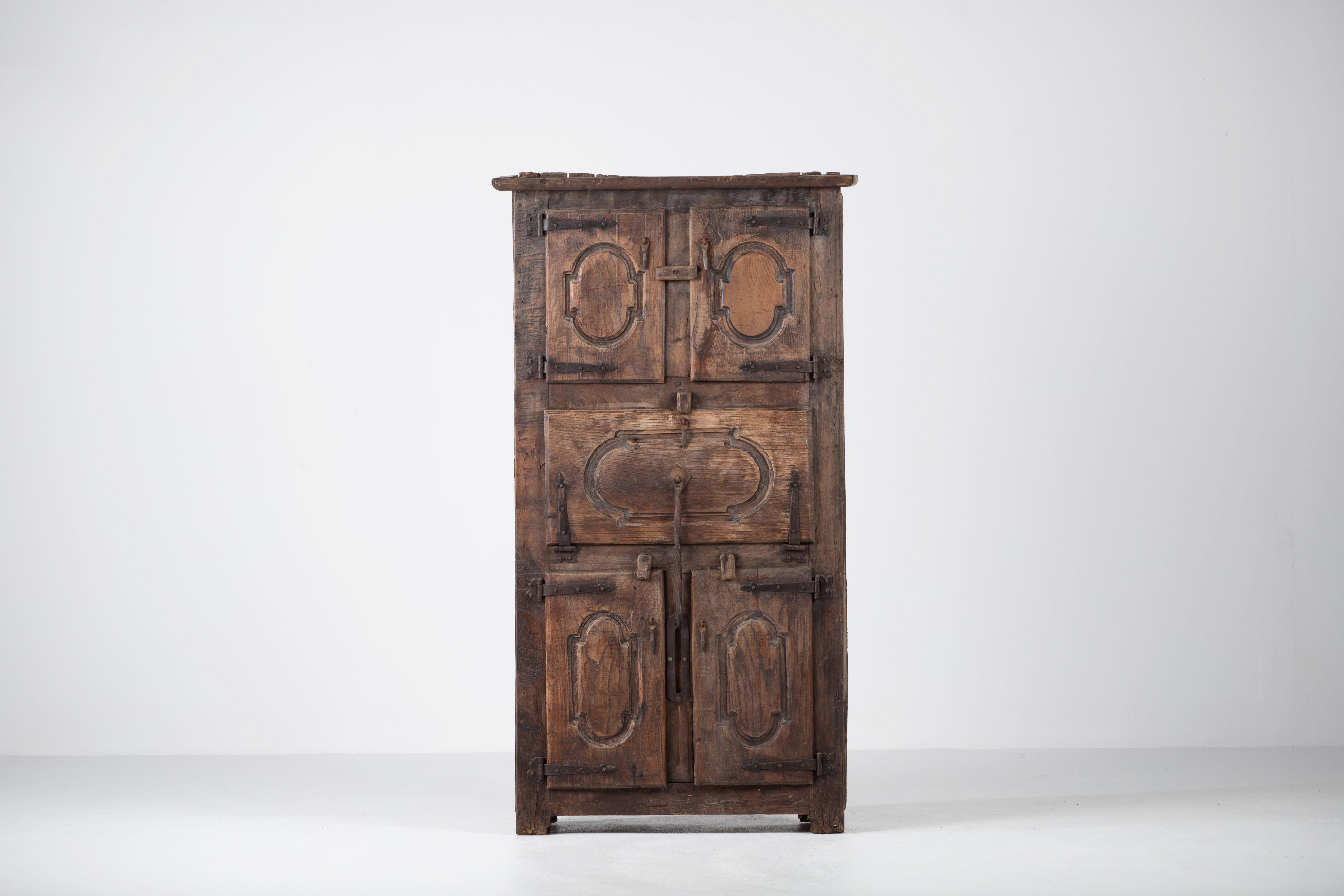 French Provincial Timber Monument: An 18th-Century Pyrenean Armoire in Solid Oak For Sale
