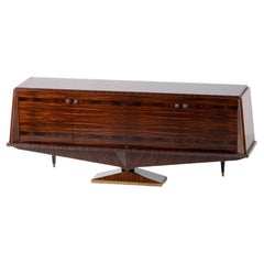 Una composizione di riserva scultorea: Credenza in cocobolo francese con base a diamante