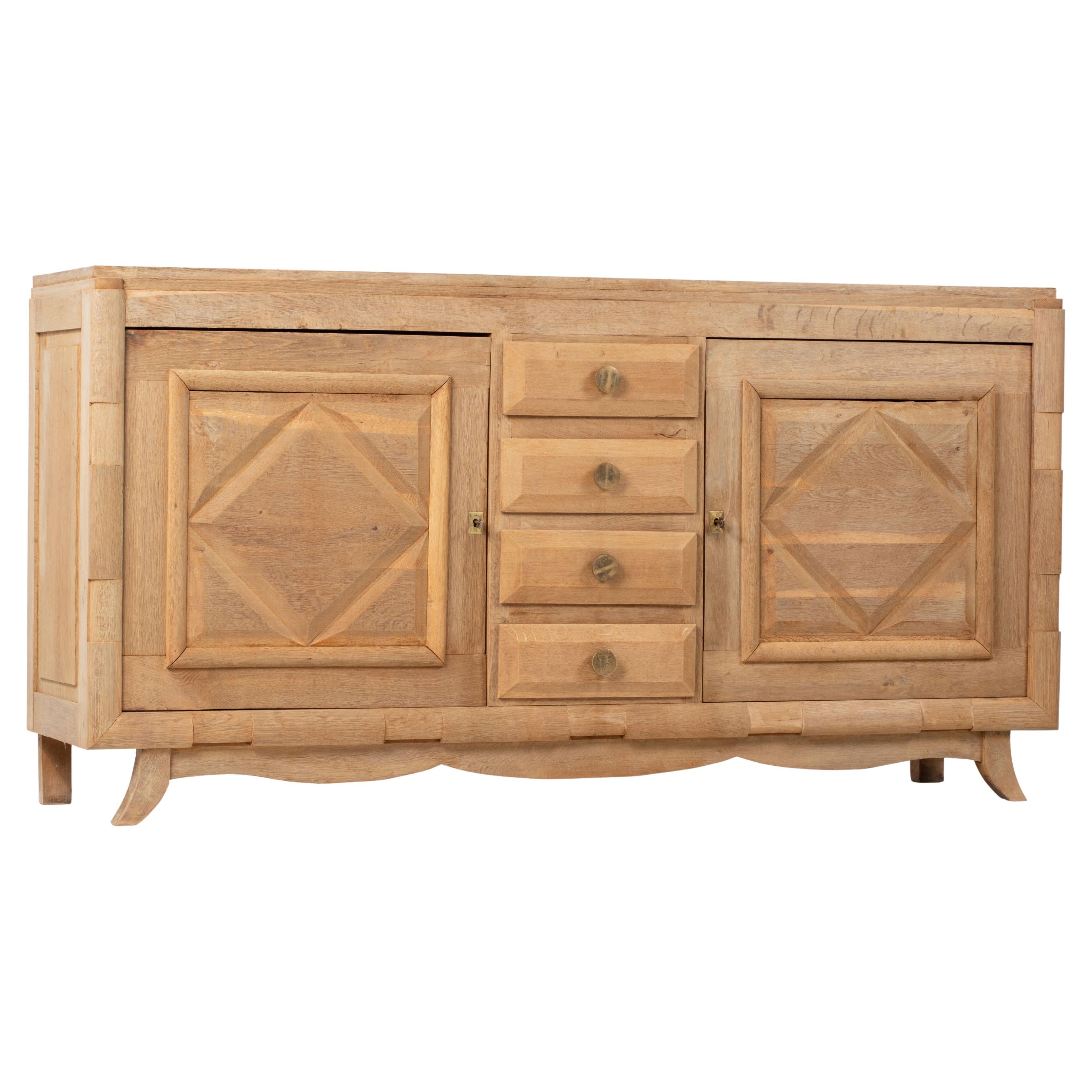 A Composition of Restrained Geometry: French Oak Credenza, 1940s For Sale