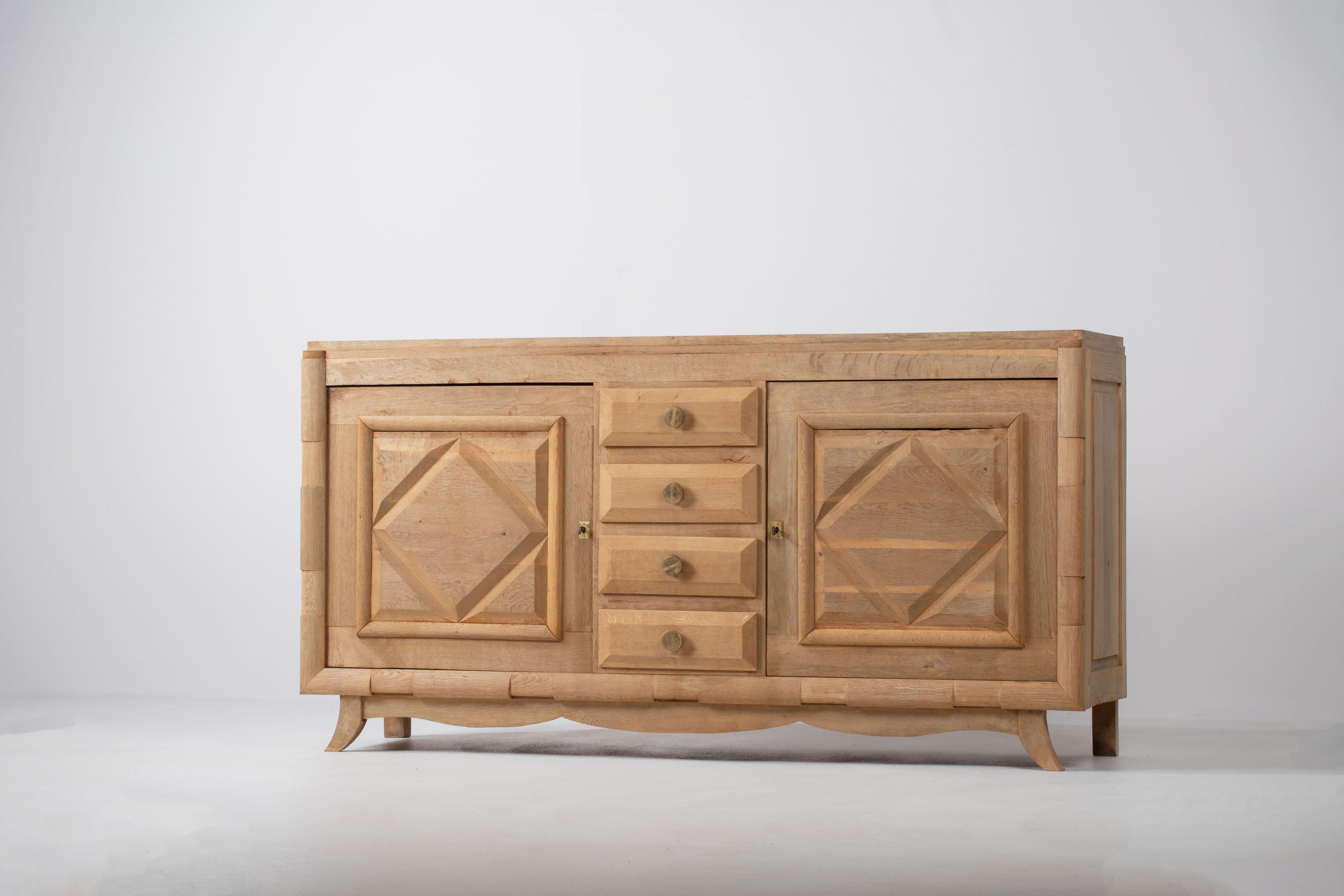 Mid-20th Century A Composition of Restrained Geometry: French Oak Credenza, 1940s For Sale