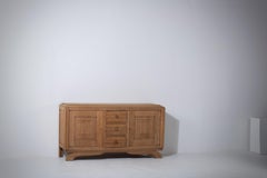 Oak Sideboard with Carved Panels on Shaped Sled Base, France, 1940s