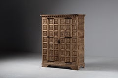 Carved Oak Armoire with Rosette Panels and Iron Strap Hinges, Spain, 1940s