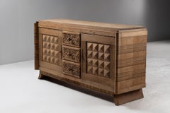 Carved Oak Buffet with Diamond-Point Doors and Floral Drawers, France, 1940s