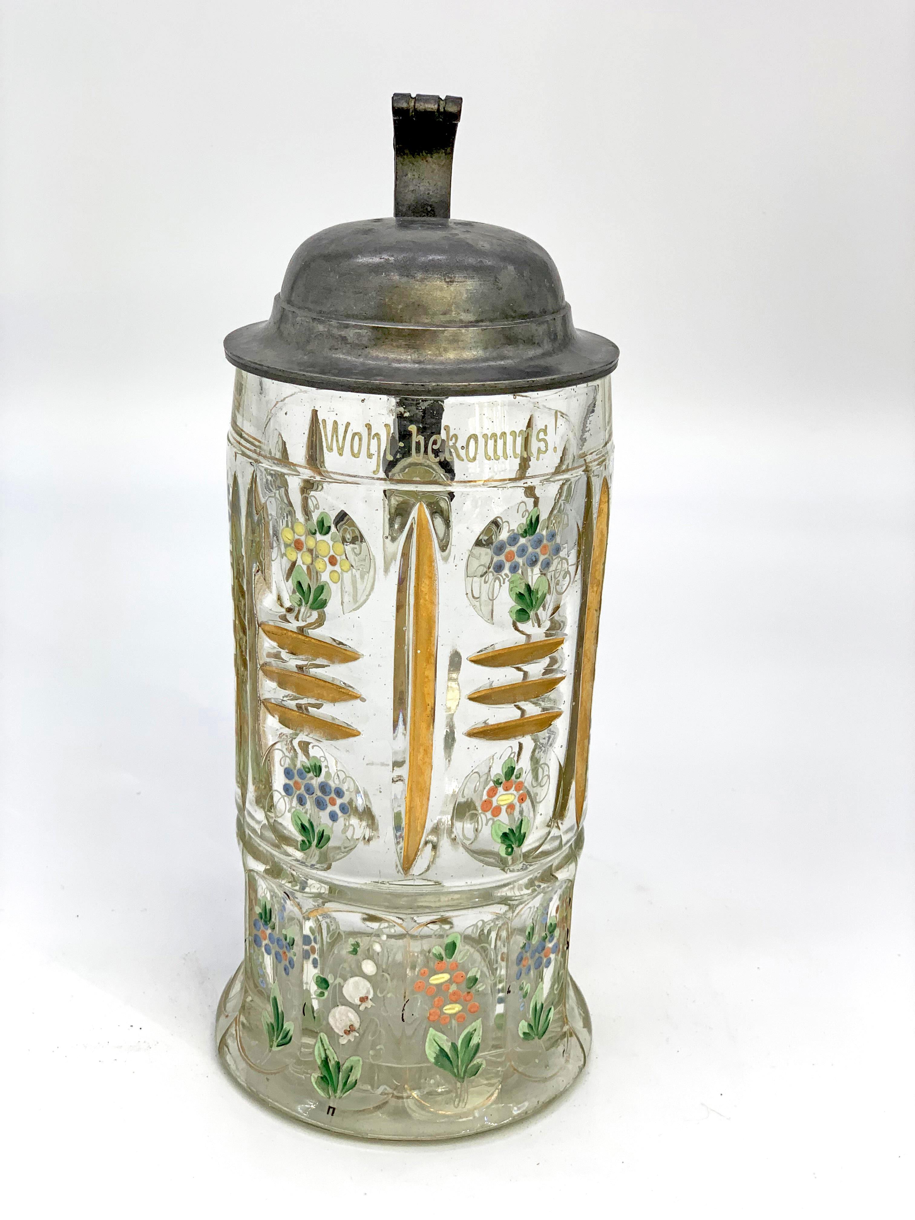 Beautiful one of a kind beer mug 19th century.
Beautiful flowers and geometry adorns this mug with tin top.
 