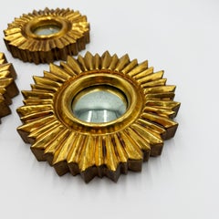 Set of Three Sunburst Mirrors · Hand-Carved Wood with Gold Leaf