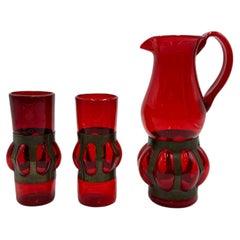 Jarra y dos vasos · Vidrio soplado y bronce · Felipe Delfinger para Feders