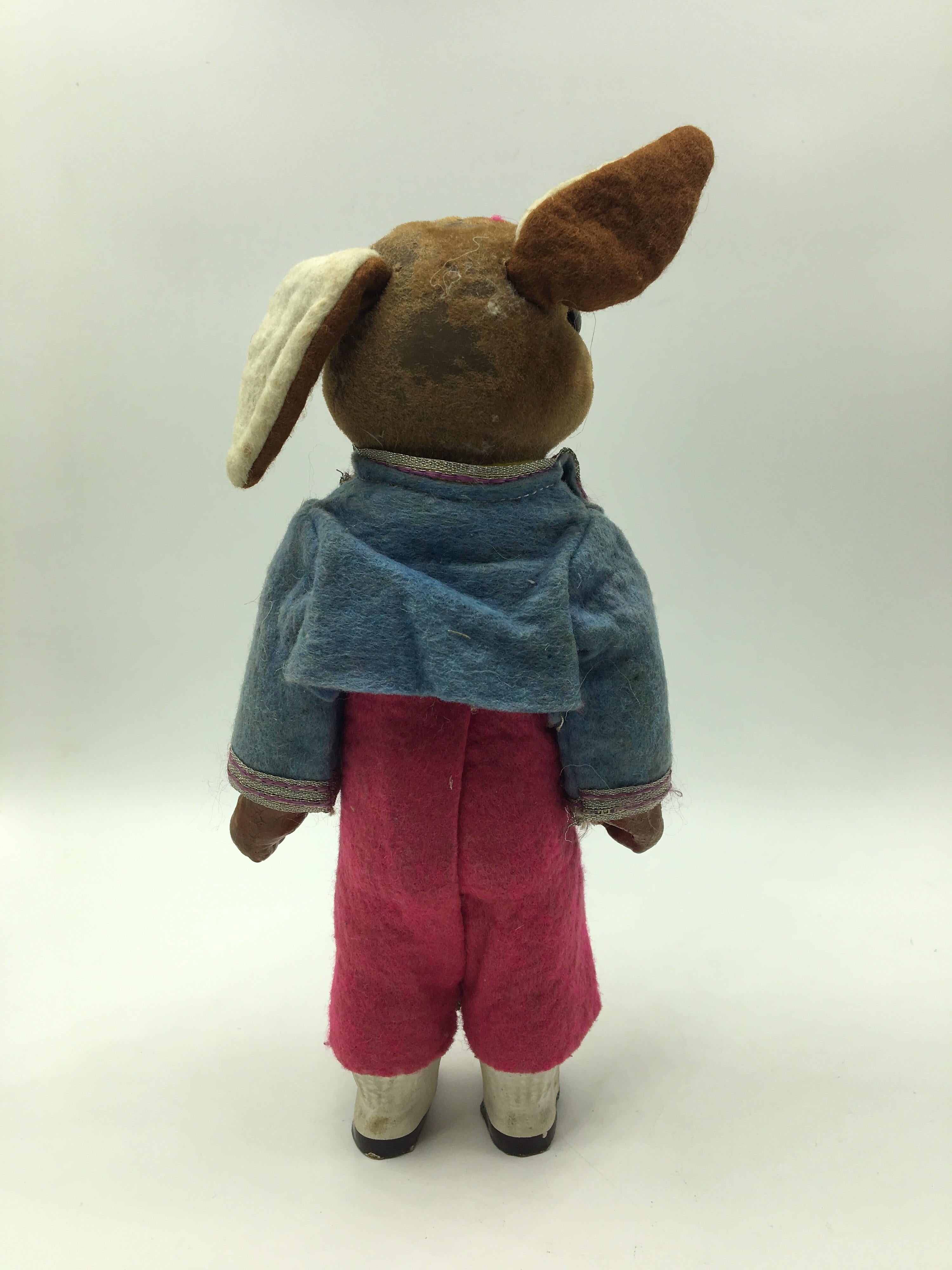 For lovers of antique and vintage toys we offer a rabbit toy made of textile and carton made in US, 1950s.