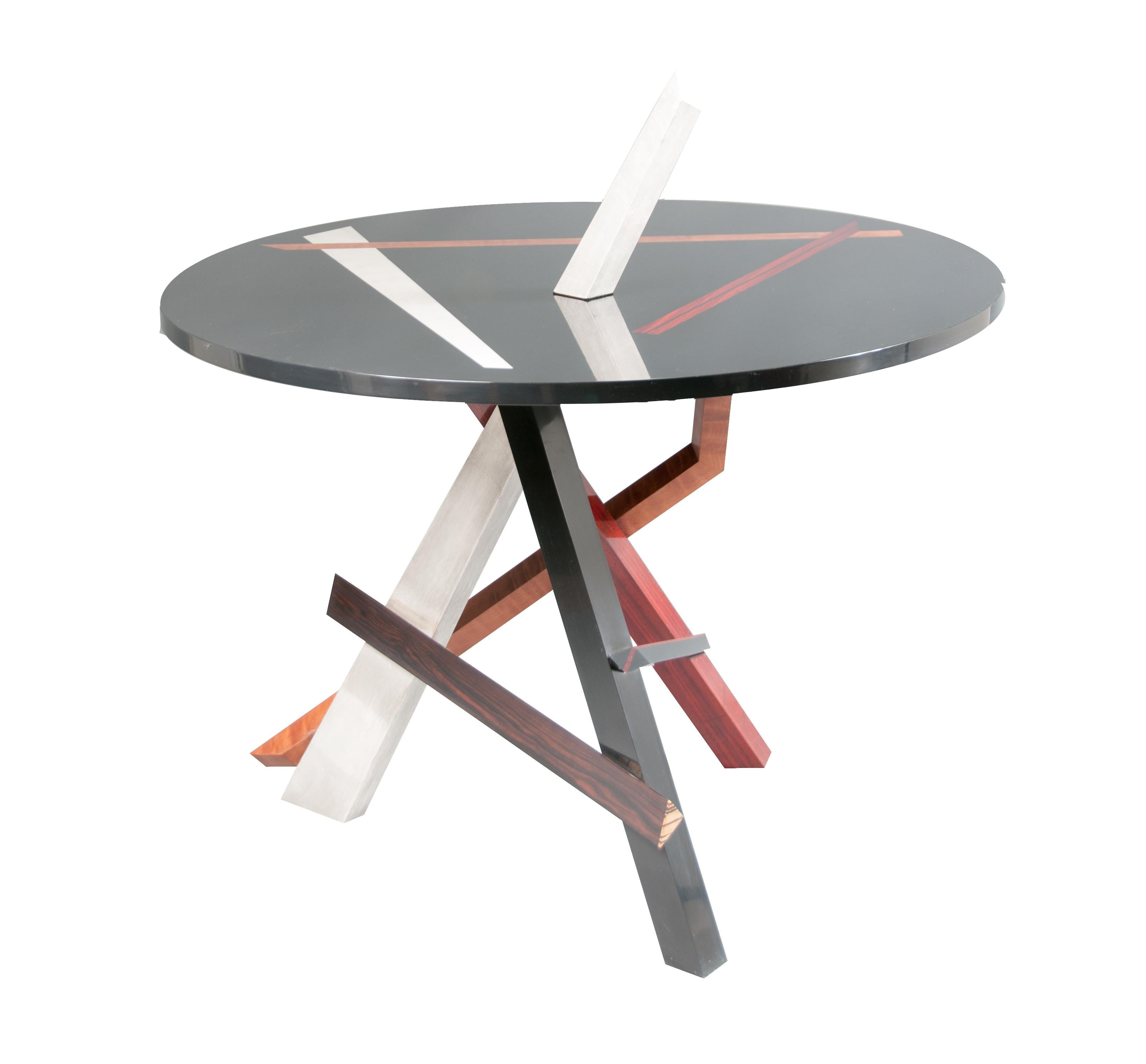 Title: “Convergence”

About The Piece:  This one of a kind signed and titled functional piece of art was designed to function as a center table while creating an Abstract Expressionistic sculpture reminiscent of the works of Mark di Suvero and David