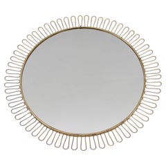 large Mid-Century Modern brass round french loop wall mirror, 1950s