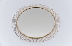 large Mid-Century Modern brass round french loop wall mirror, 1950s