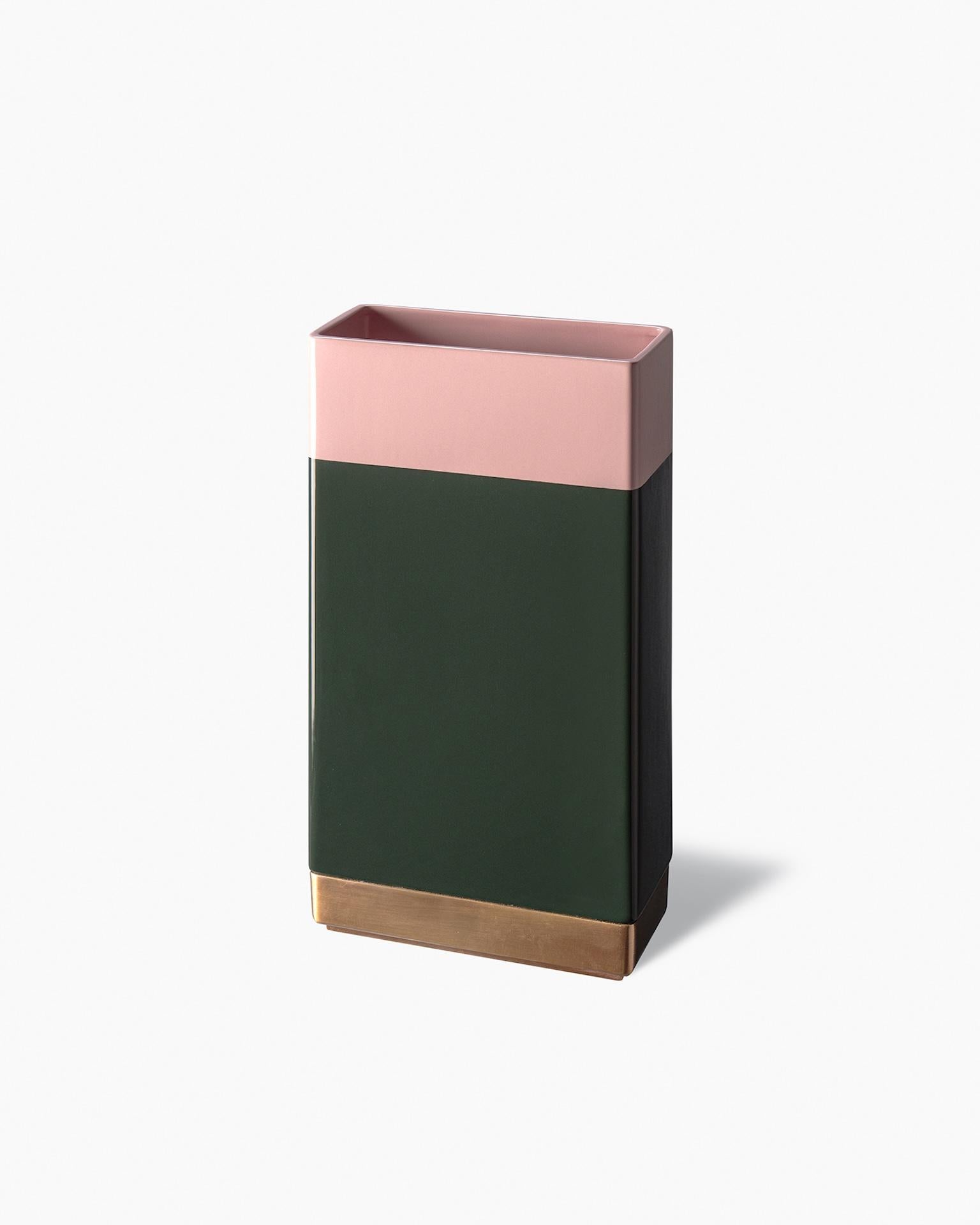 Tall rectangular shape made by slip casting in white clay. The surface is hand-smoothed and fitted with a brass section. Finished with a two-tone glaze in pink and glossy green.

Year of production: 2017.

All Bitossi ceramics are entirely handmade