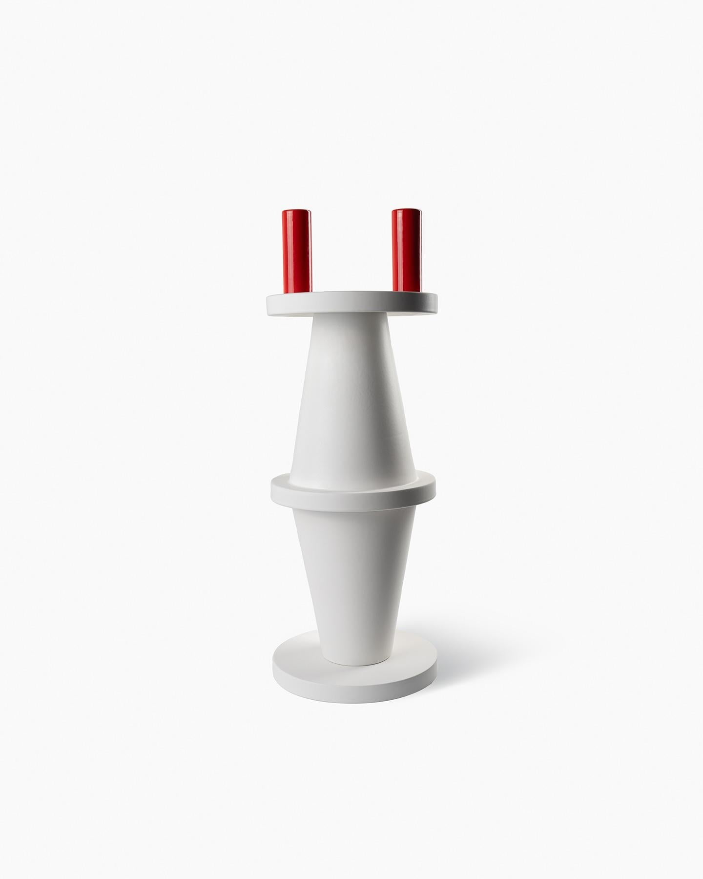 Nathalie Du Pasquier designed a collection
of three vases for Bitossi, in 2004. The
vases are bottle‑shaped and composed
of stackable elements. The formal and
chromatic research is closely linked to her
painting. Using the lathe technique, the
vases