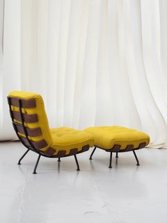 Sillón y otomana Tacchini Costela, diseñados por Martin Eisler
