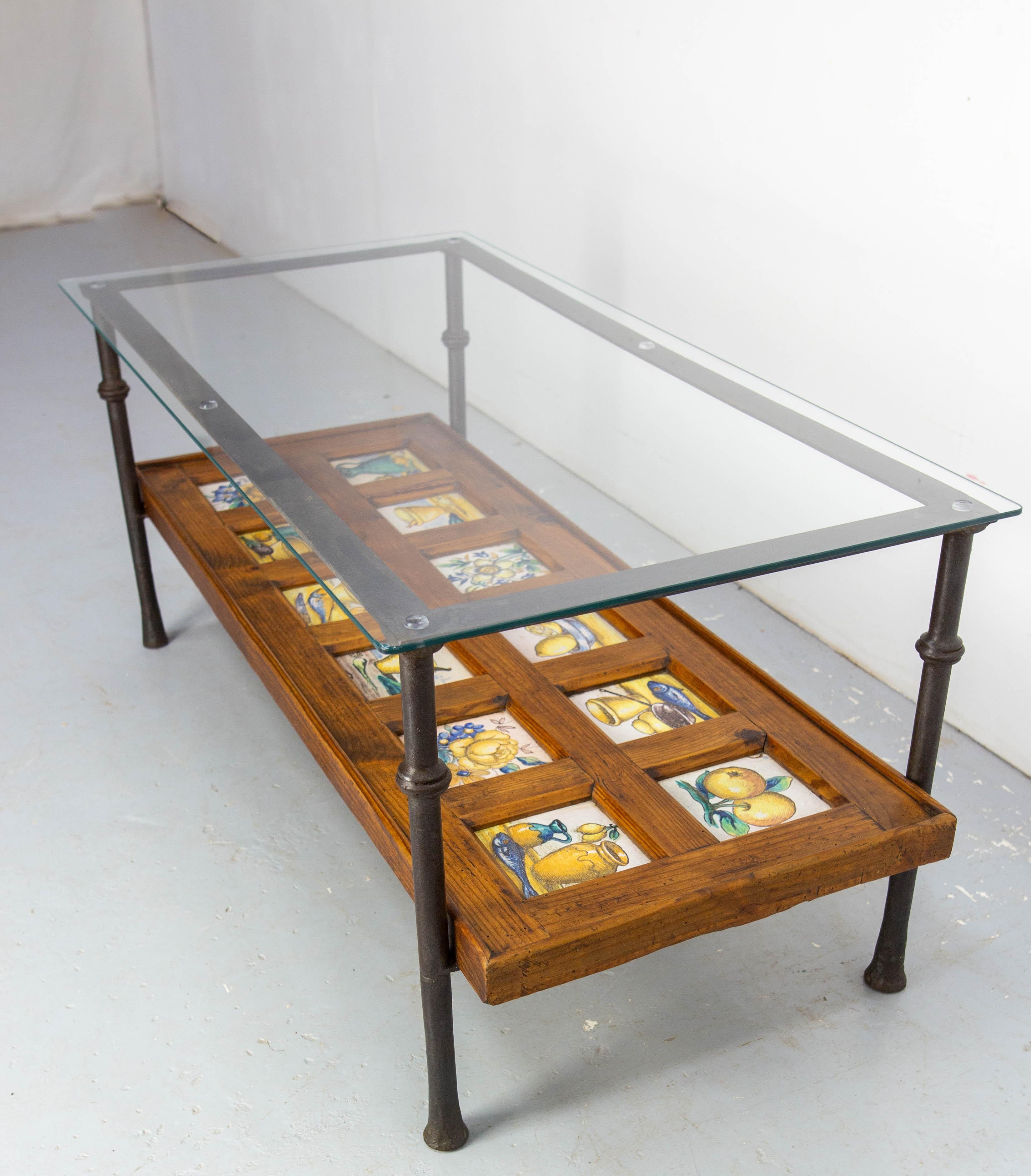 Mid-20th Century Spanish Wrought Iron Glass & Pine Coffee Table with 19thC faience circa 1960 For Sale