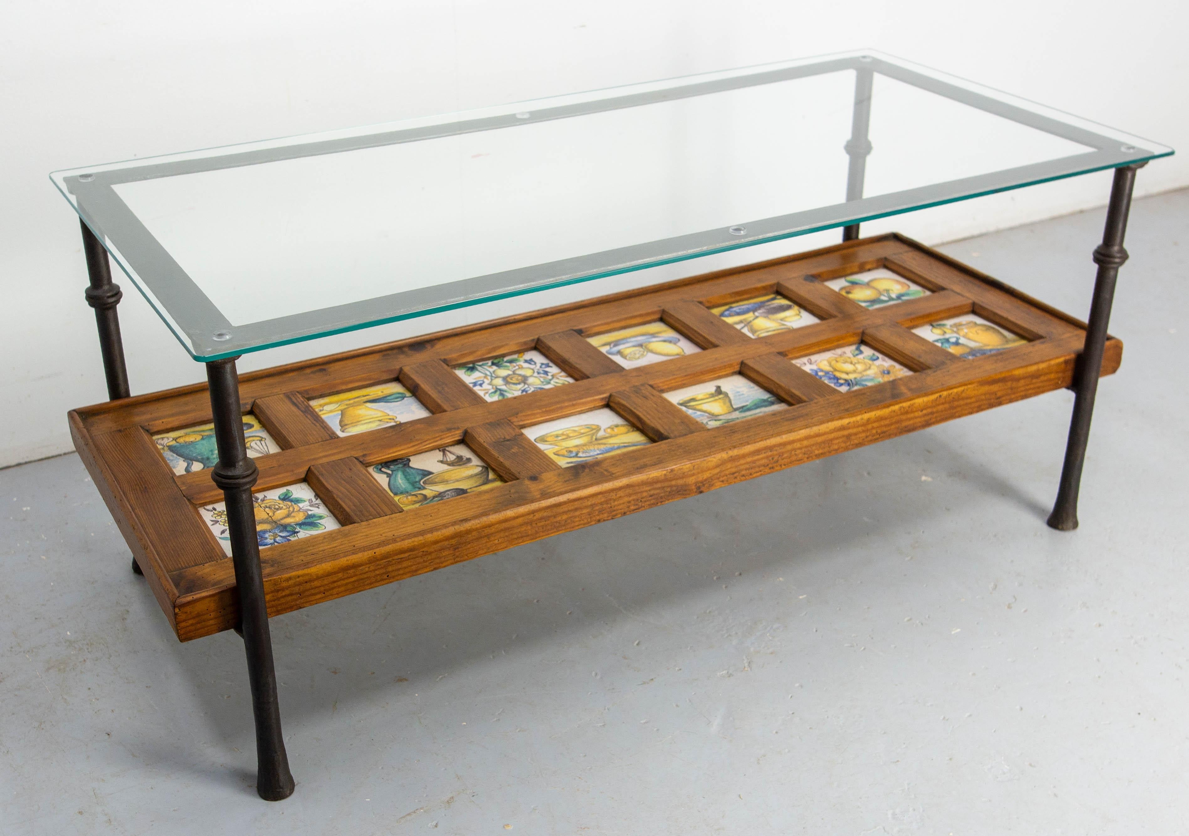 Spanish Wrought Iron Glass & Pine Coffee Table with 19thC faience circa 1960 In Good Condition For Sale In Labrit, Landes