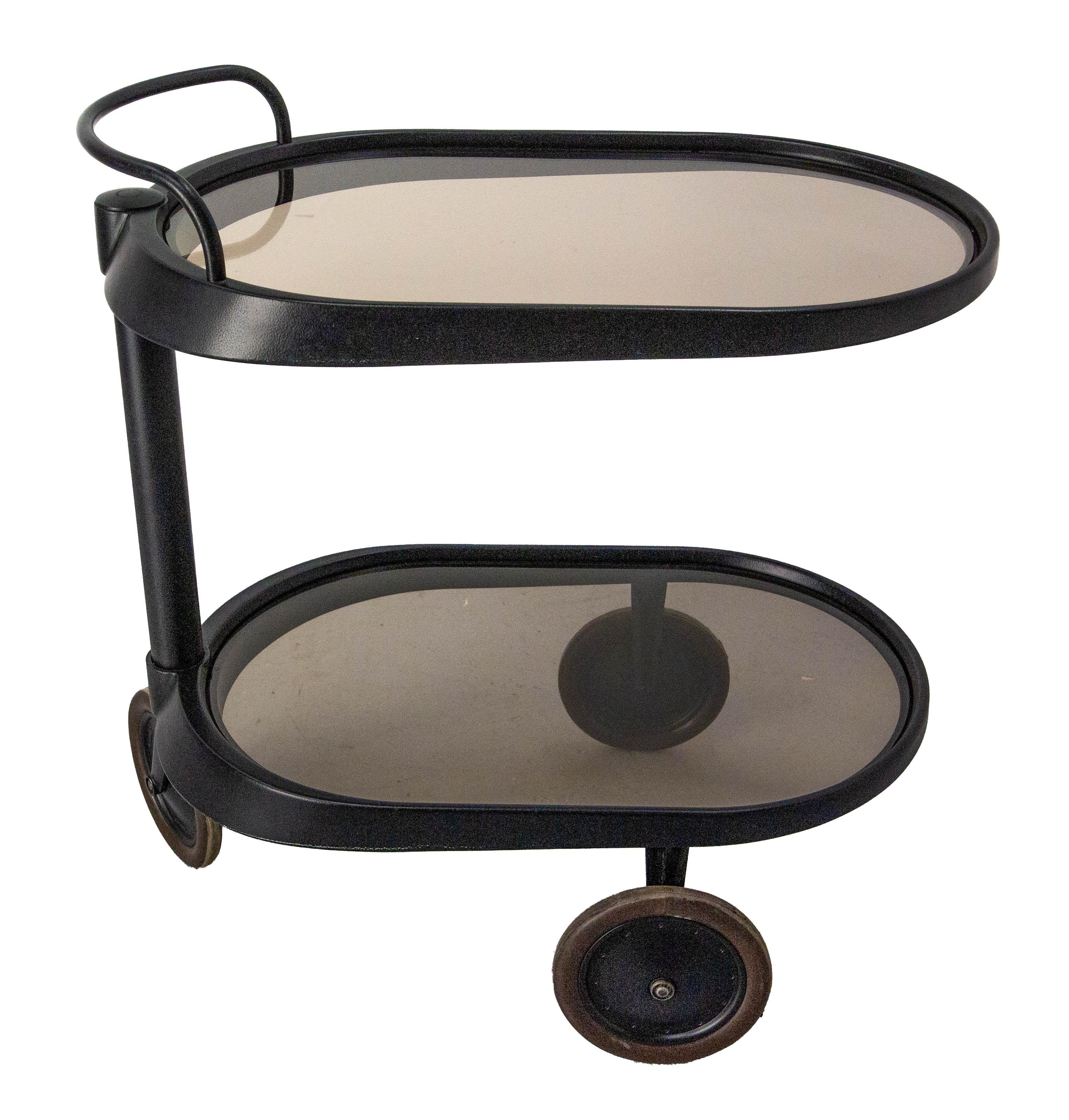 Elegant modern trolley designed by Enzo Mari for Alessi in 1989.
Handlebar above a cylindrical shaft side support, on three wheels, stamped Alessi.
Very hard to find, especially in this color.
Complete with the original Alessi leaflet.
This will be