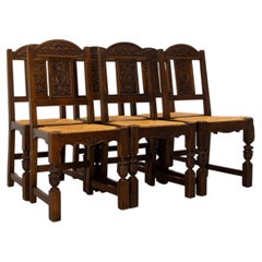 Six Spanish Oak Dining Chairs Rush Seats, circa 1950