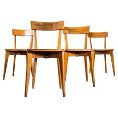 Chaises de salle à manger françaises des années 1950, en bois courbé, avec piètement en croix « Luterma » – Lot de 4