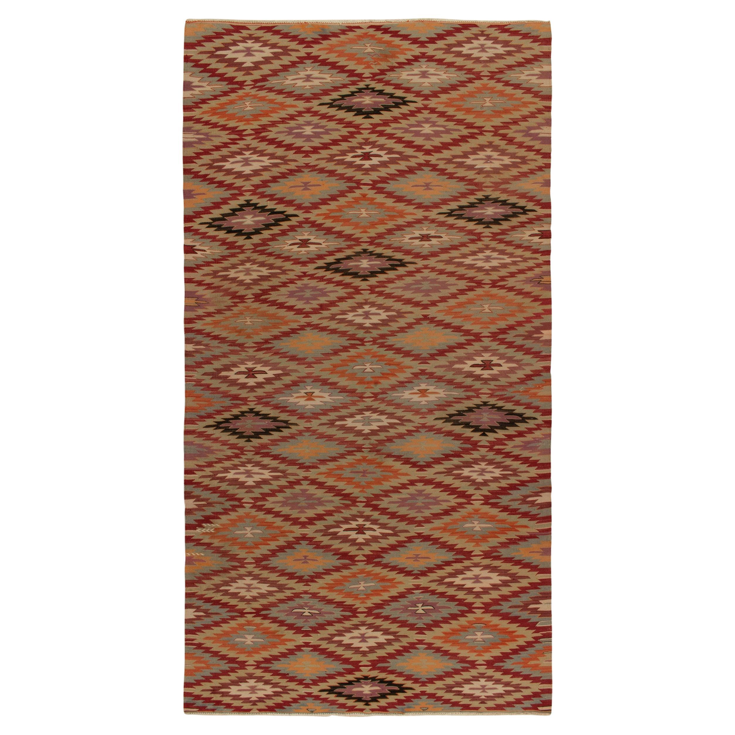 Stammeskunst-Kelim-Teppich in Rot, Orange und Blau mit geometrischen Mustern