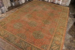 Hand Knotted Antique Oushak Rug in Red and Green Floral Pattern