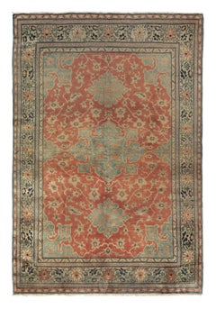 Tapis persan ancien noué à la main à motifs floraux rouges et bleus de Rug & Kilim