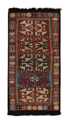 Rug & Kilim’s Tribal style rug in Red, Brown and Blue geometric pattern