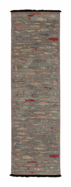 Rug & Kilim’s Pictorial Style runner in Blue, Beige and Red Fish Patterns