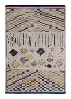 Rug & Kilim’s Moroccan Style Rug in White with Black and Gold Geometric Pattern