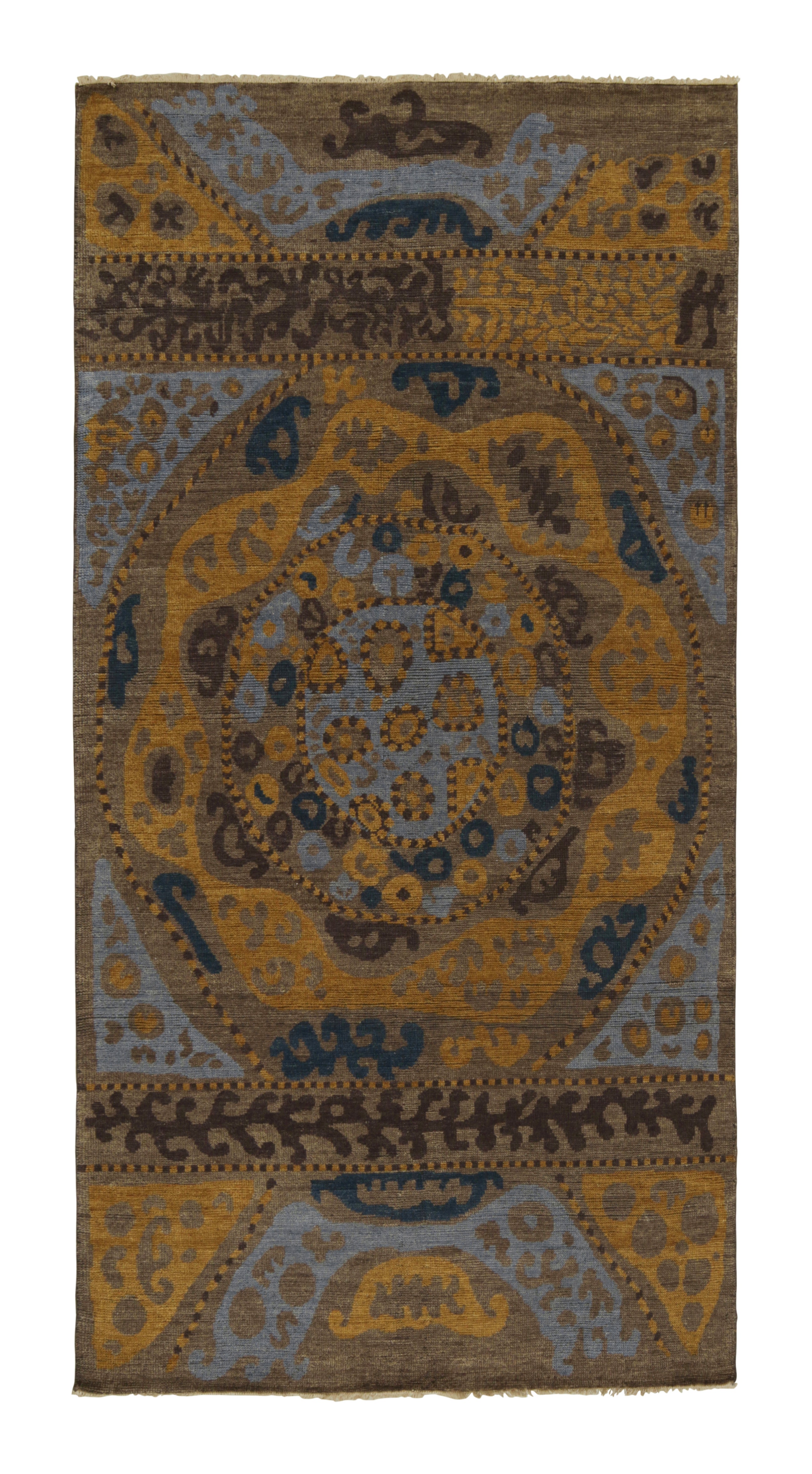 Rug & Kilim’s Tribal Inspired Rug in Blue, Brown, Gold Geometric Patterns
