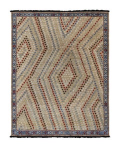 Rug & Kilim’s Tribal Style rug in Beige with Red, Blue & White Geometric Pattern