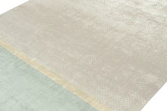 Rug & Kilim’s Modern Rug in Blue with Gold Stripe and Beige Geometric Pattern
