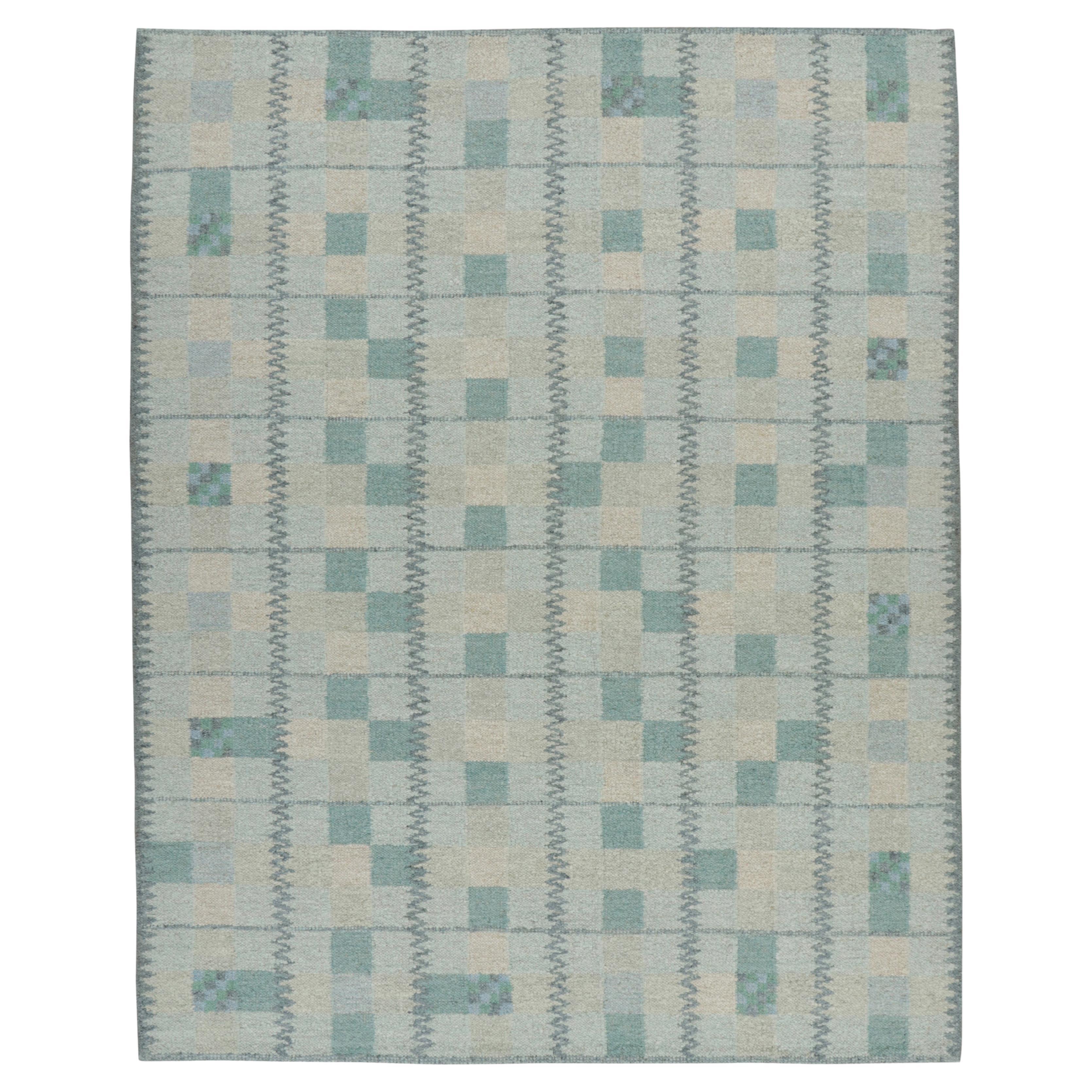 Rug & Kilim's Teppich im skandinavischen Stil in blaugrünen Tönen mit geometrischen Mustern