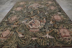 Rug & Kilim’s Armorial Tudor Style Rug in Black, with Beige, Blue and Gold Tones