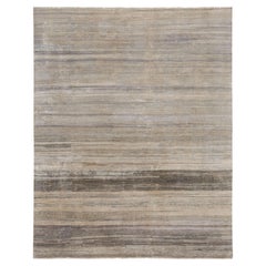 Rug & Kilim: un tappeto testurizzato nei toni del grigio e delle striature