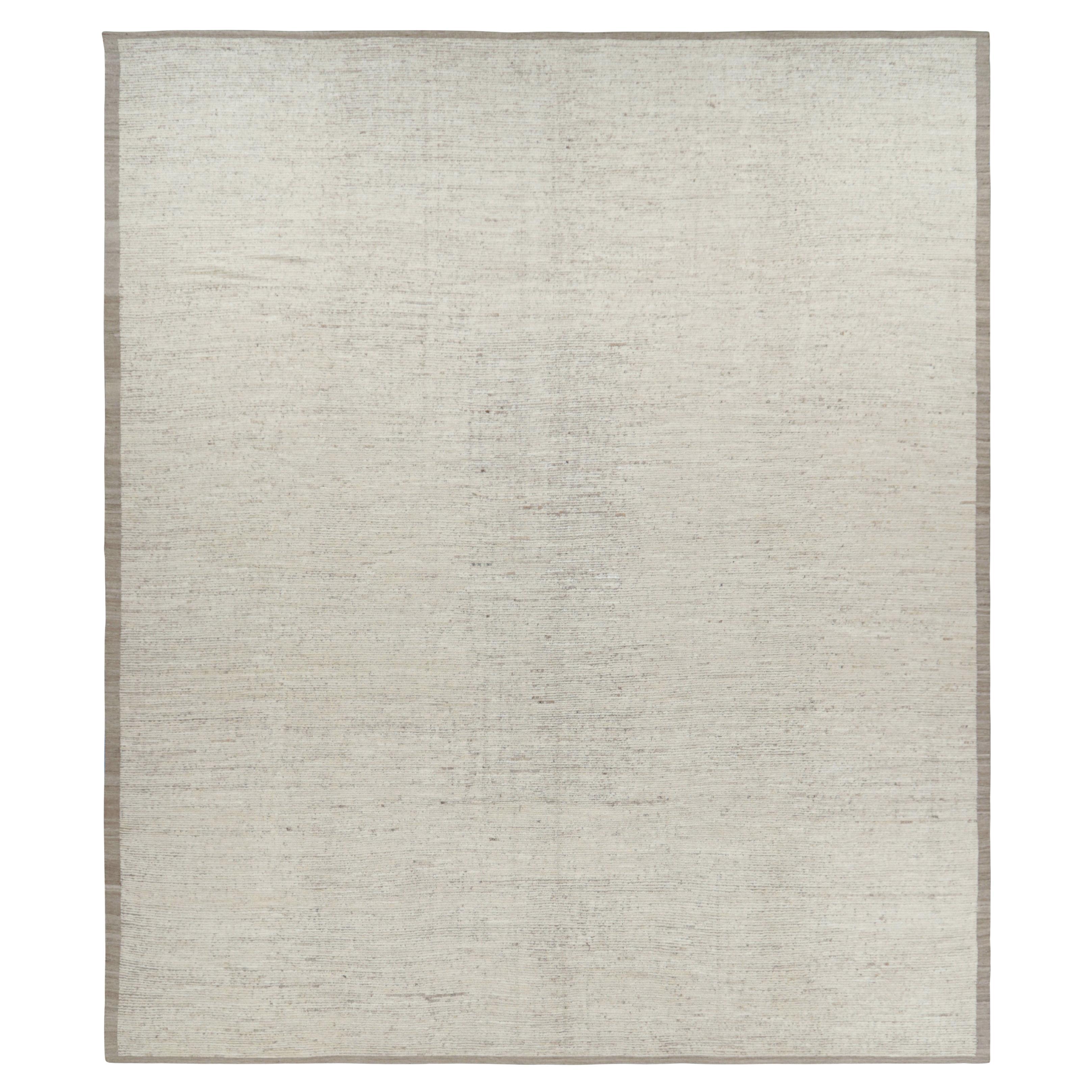 Rug 
Kilim è un kilim sovradimensionato con strisce e striature testuali beige e bianche.