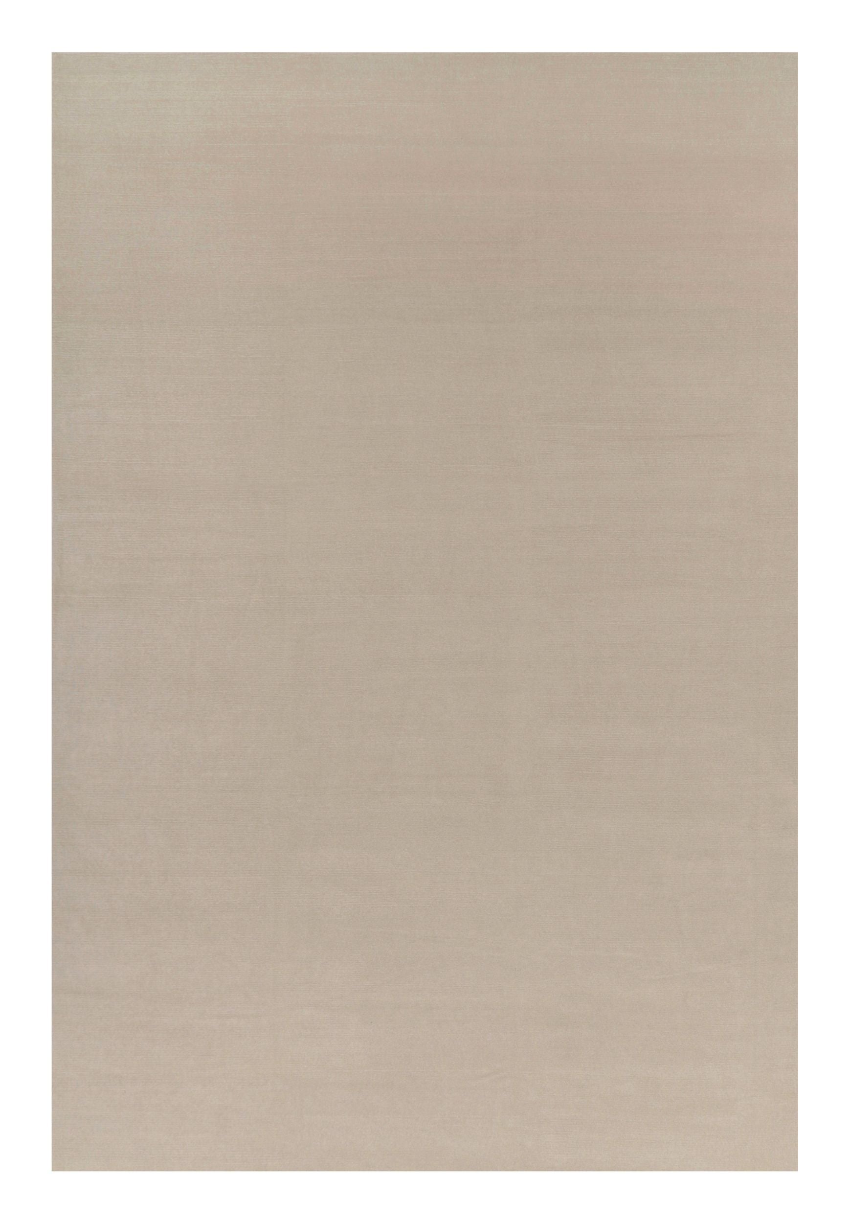 Rug & Kilim’s Oversized Contemporary Textural Solid Rug in Cream and White Tones