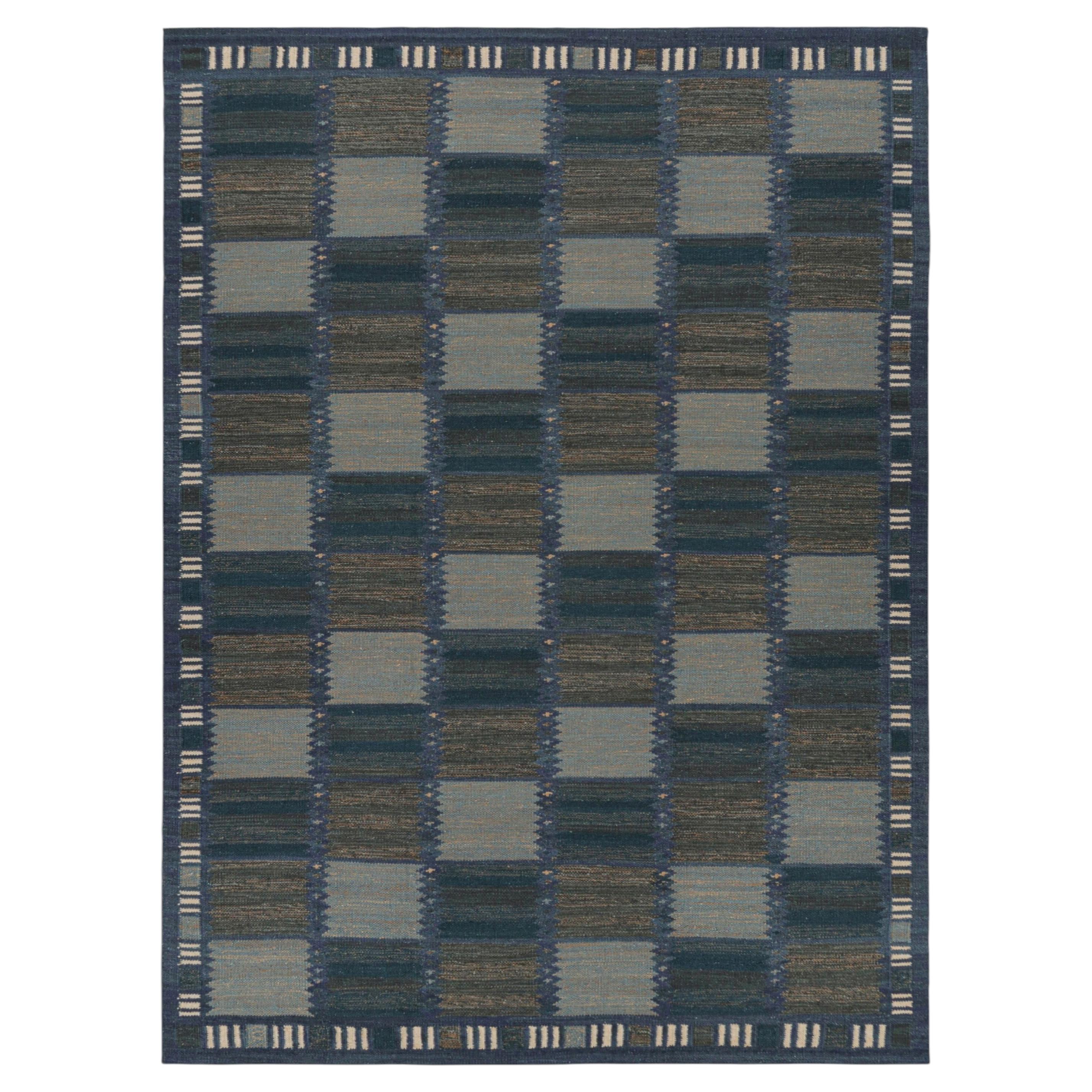 Rug & Kilim’s Scandinavian Rug in Blue and Brown Geometric Patterns