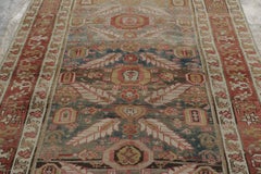 Antique Heriz Rug with Geometric Medallion and Red-Toned Border - Rug & Kilim