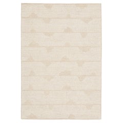 Tapis contemporain géométrique en laine beige et ivoire, signé Rug & Kilim, Inde