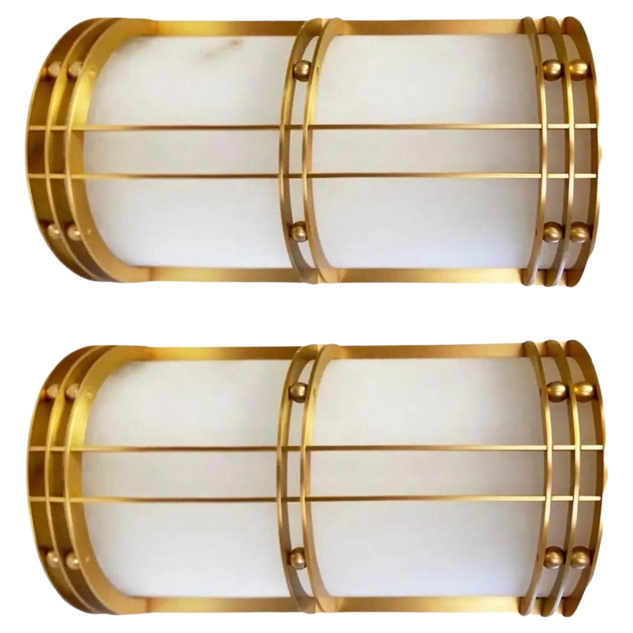 We have another one in bronze and with cream-colored alabaster
The fastening system allows it to be attached to the wall or ceiling
  ceiling lamp(last photo)

Very nice sconces, They are like news

 Pair of natural  alabaster wall sconces and brass