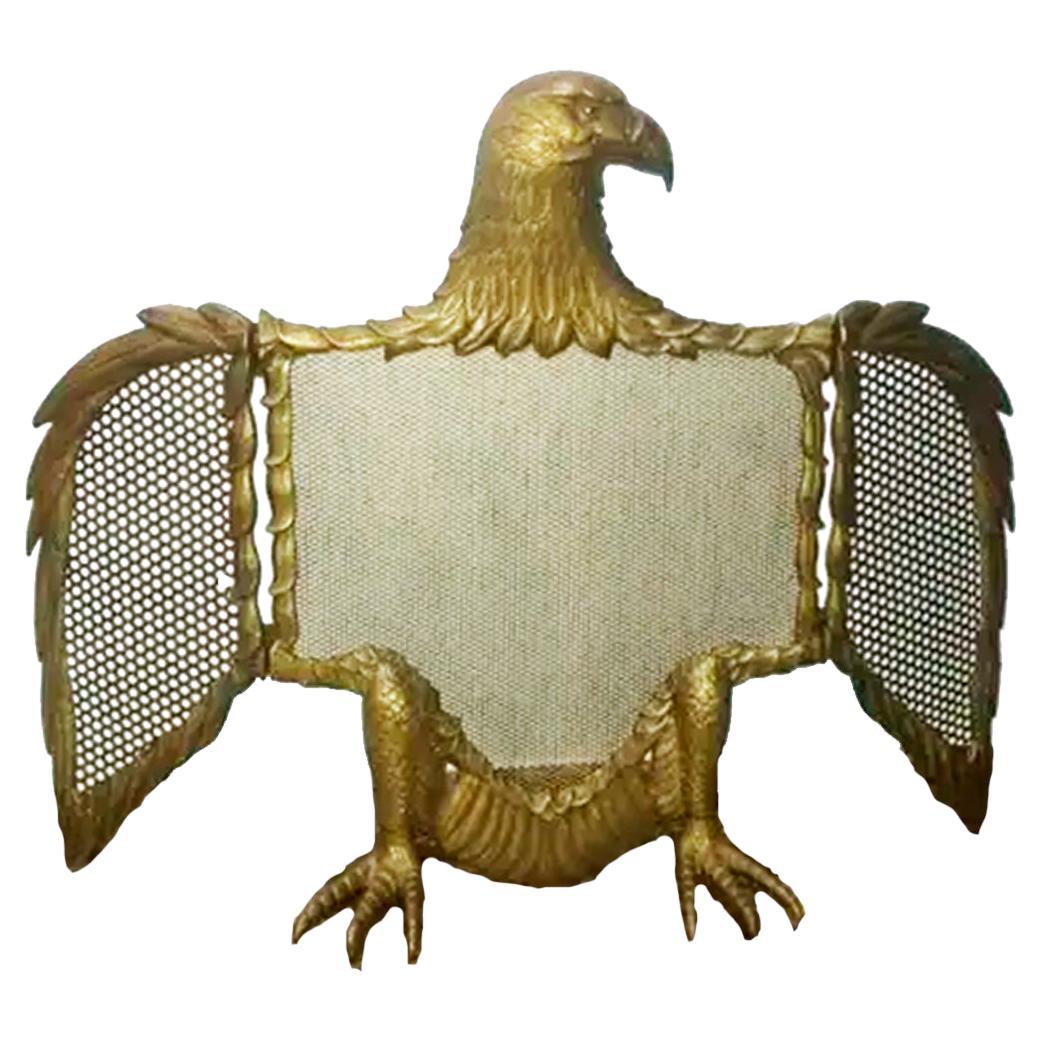 Three-panel fire screen bronze or brass eagle-shaped sparks

Save bronze or brass eagle-shaped sparks with open wings that fold.
FireSceen ,original, 

ANDIRONS EAGLE SHAPE IN ANOTHER AD.

Spark saver or protective screen for fireplaces in the shape